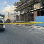 Murder Suspect's Remand Hearing to Proceed in Absentia