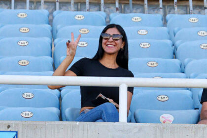 Olympiakos Nicosia Celebrates Victory Signal at GSP