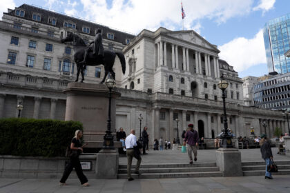 UK Firms Anticipate Job Cuts While Raising Prices, BoE Survey Insights
