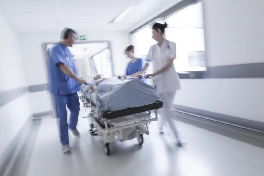 Flu Deaths Rise to 12 Amid Hospital Strain