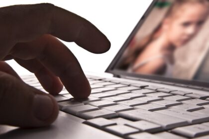 Man Charged with 15 Counts of Child Pornography Involving His Daughter